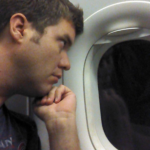 Matt looking out the airplane window