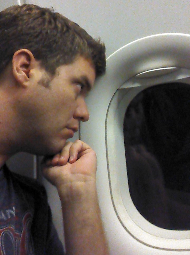 Matt looking out the airplane window